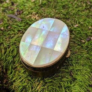 Small jewelery container and pendants